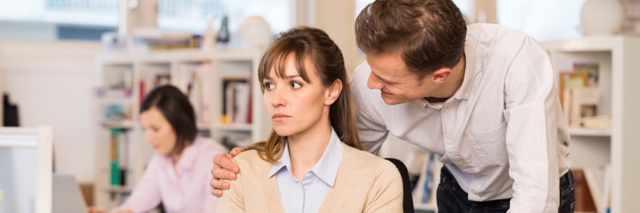 Employee Harassed at Work - Touch on Shoulder